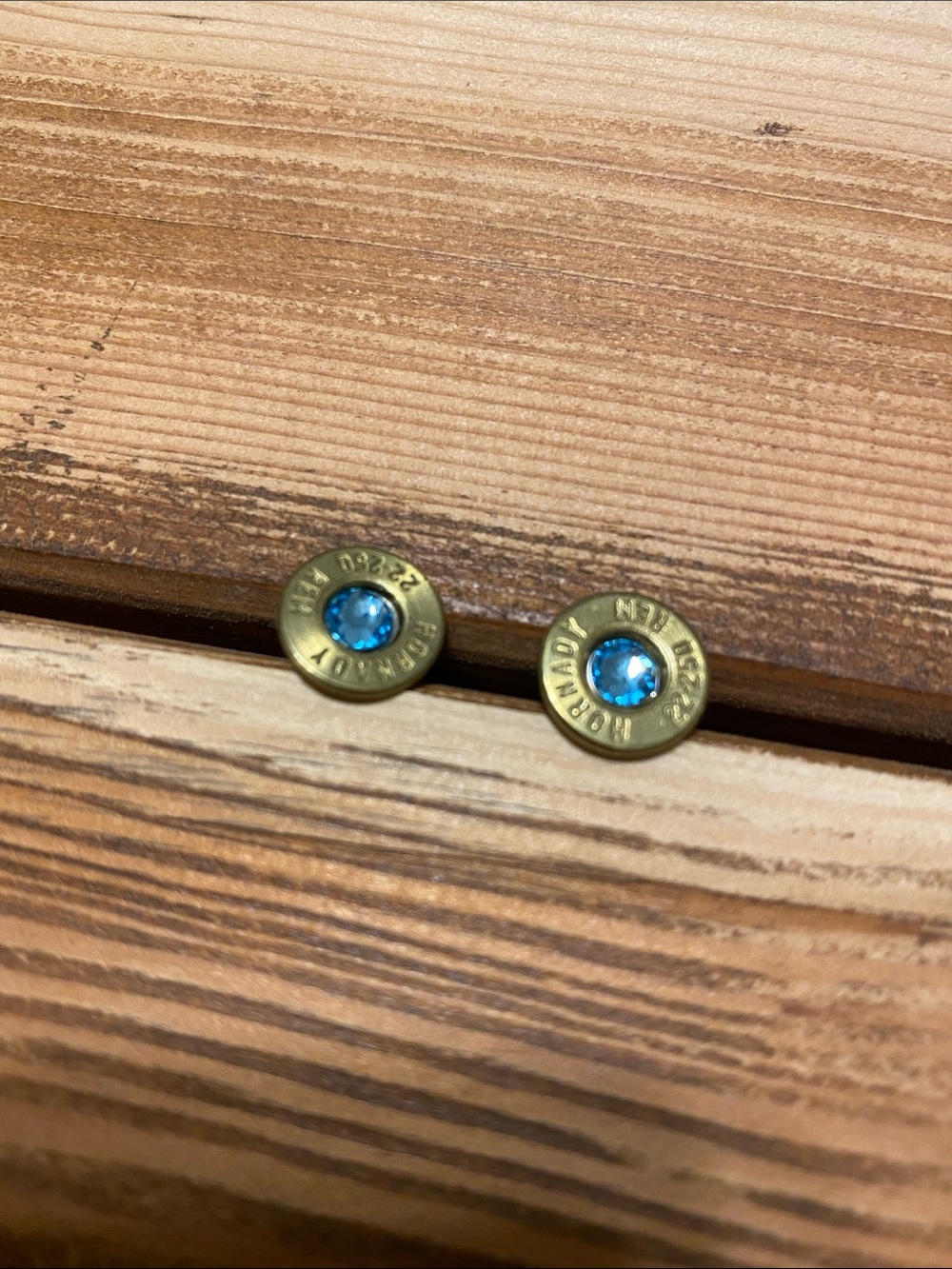 Handcrafted Brass Bullet Casing Earrings with Blue Crystal Accent